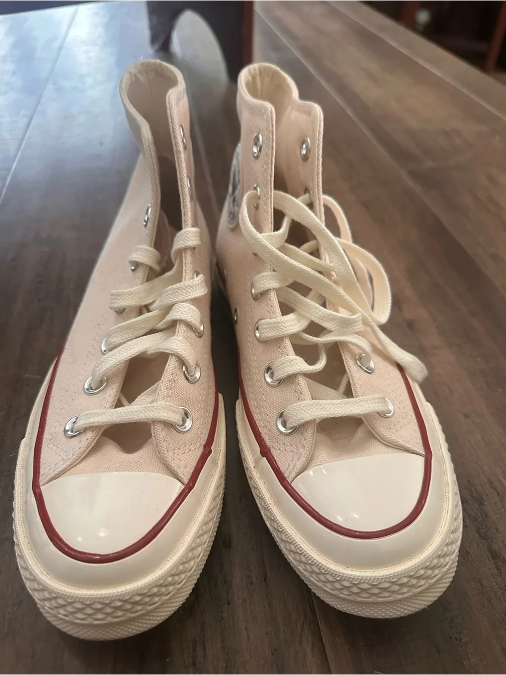 Converse High Top Sneakers in Cream with Red Trim